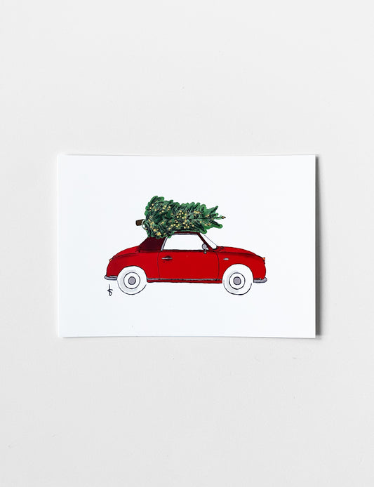 Ansichtkaart (A6) met handgetekende X-mas car illustratie in kersttinten en goudfolie.Deze stijlvolle kaart maakt onderdeel uit van een kaartenset met leuke kerstkaarten. Je kunt deze kerstkaarten en andere christelijke kaarten kopen in onze webshop.