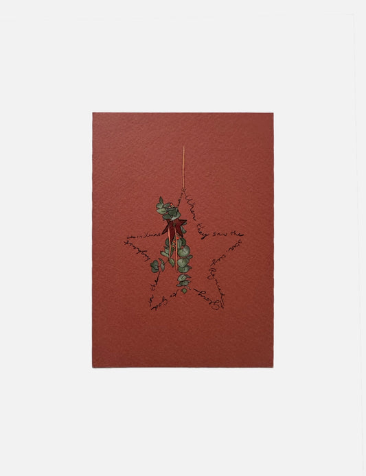 Bijzondere christelijke kerstkaart met kerstster illustratie en kerst bijbeltekst uit Mattheüs 2:10 en Lucas 2:14.