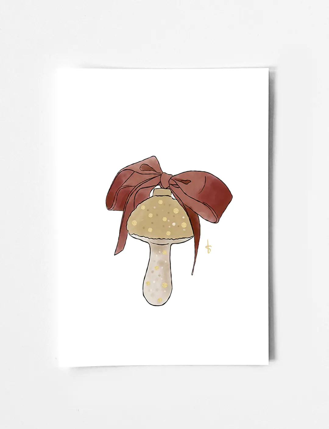 Leuke kerstkaart met handgetekende kerstornament met strik, warme kleuren en goudfolie. Bekijk al onze mooie kerstkaarten.