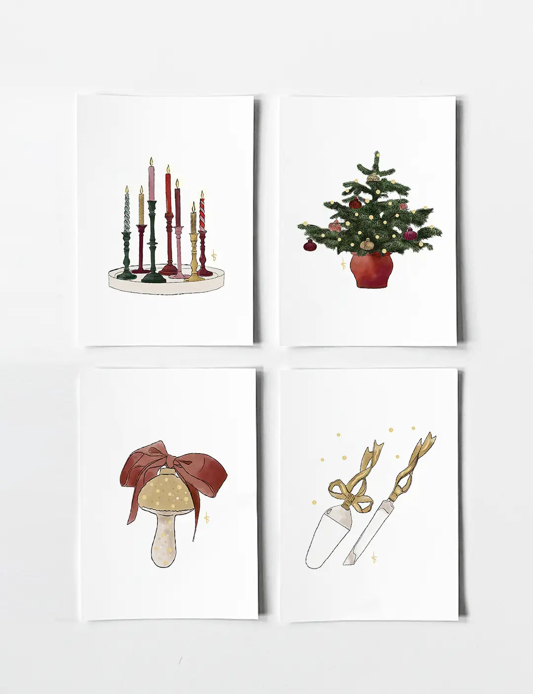 Set van 4 mooie kerstkaarten met handgetekende illustraties en luxe goudfolie, minimalistisch ontwerp. Bekijk alle leuke kerstkaarten. 