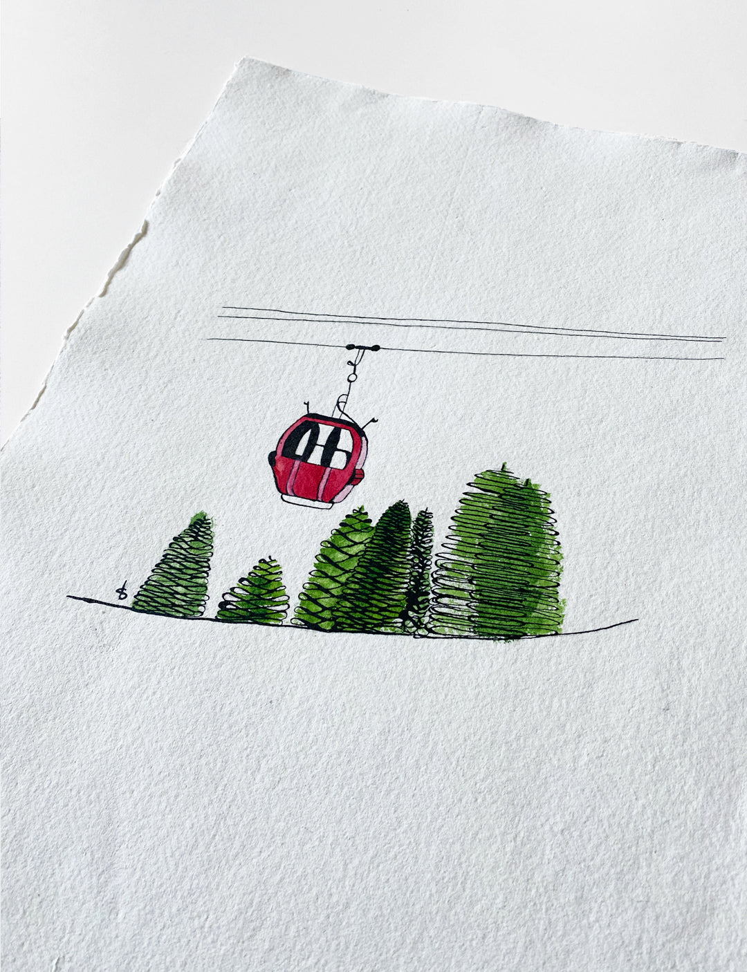 Detail van handgemaakte inkt- en aquarelillustratie op geschept papier van kerst poster met skilift, met zicht op penseelstreken en textuur.