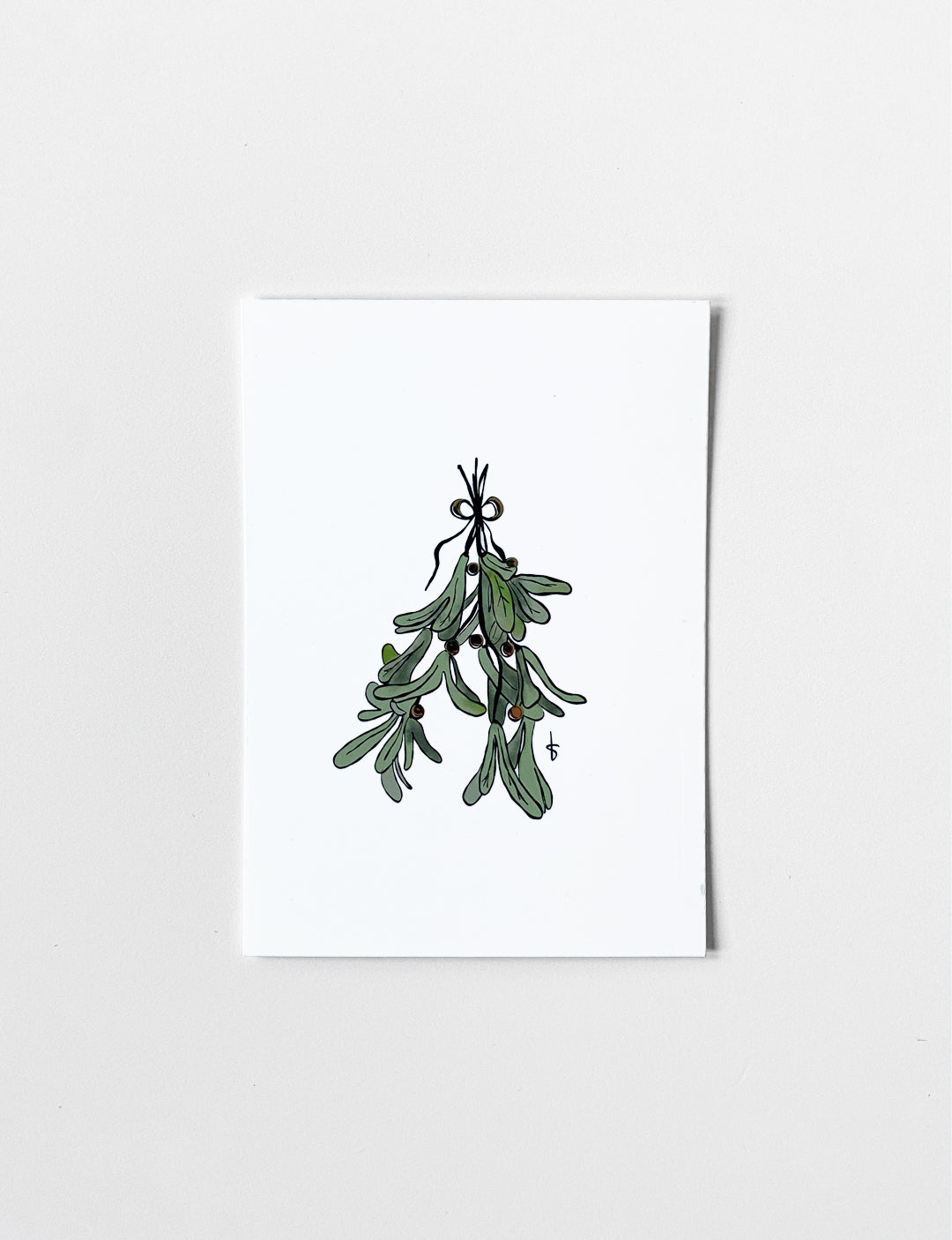 Ansichtkaart (A6) met handgetekende Mistletoe illustratie en accenten met goudfolie. Deze stijlvolle kaart maakt onderdeel uit van een kaartenset met leuke kerstkaarten. 